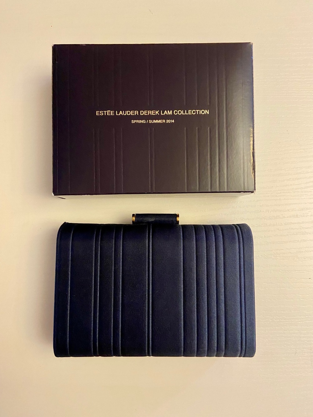 Estée Lauder Derek Lam navy minaudiere